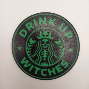 "Drink up witches" bordskåner