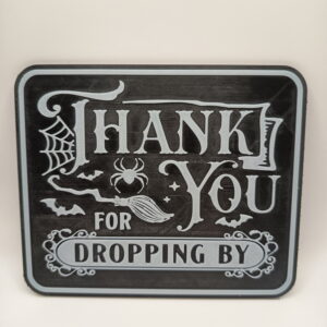 "Thank you for dropping by" skilt